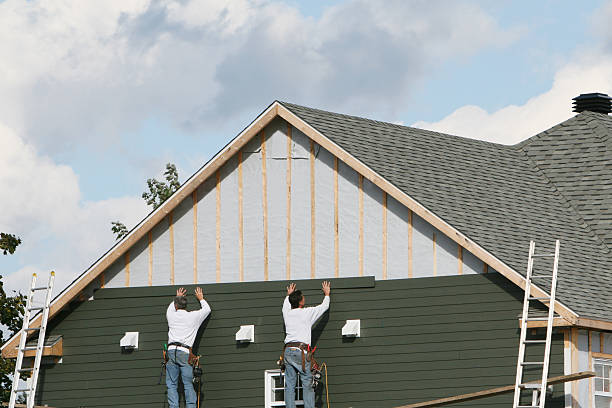 Professional Storm Damage Siding Repair technician working in Rebersburg, PA